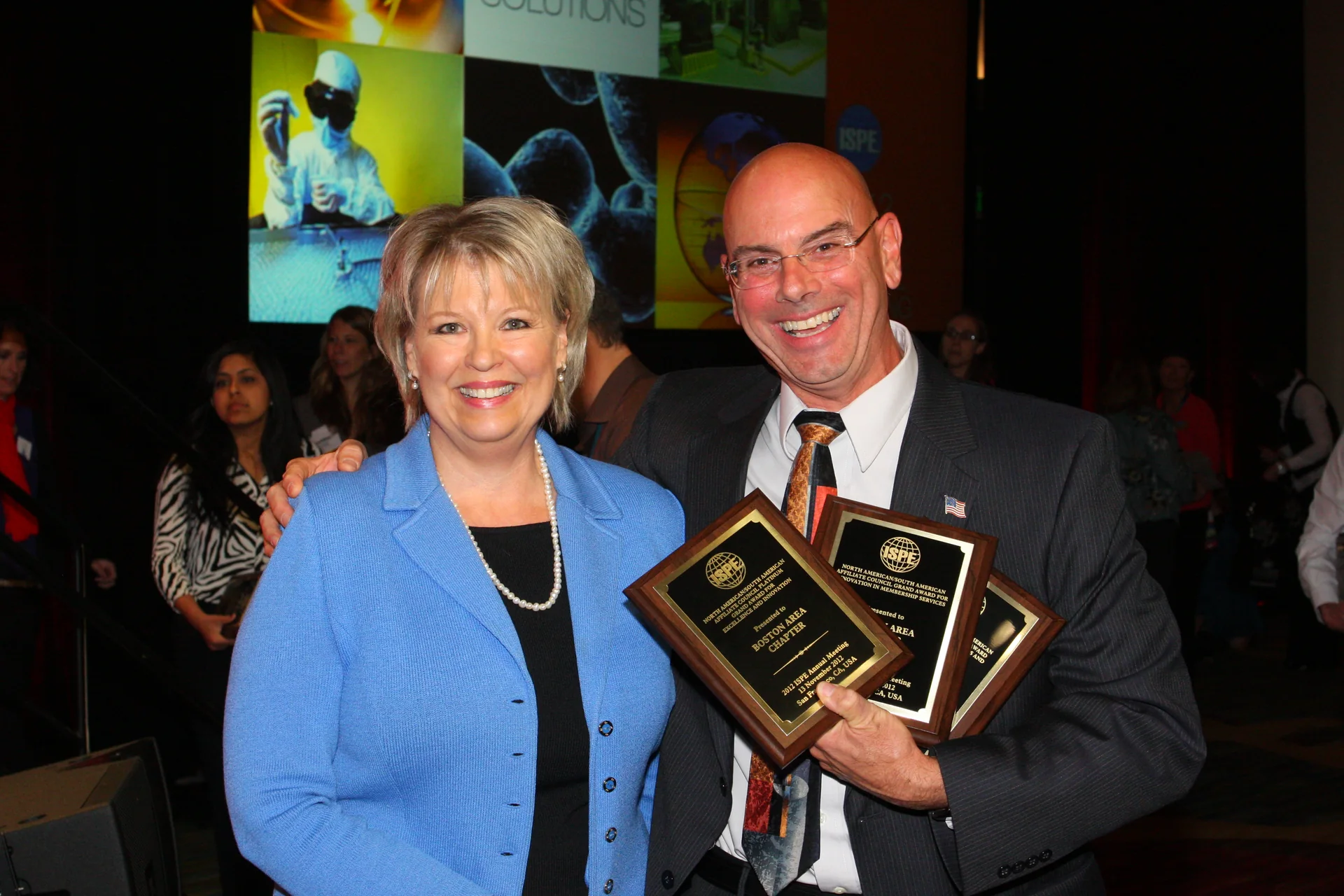 Brian Hagopian with ISPE president Nancy Berg after receiving chapter awards