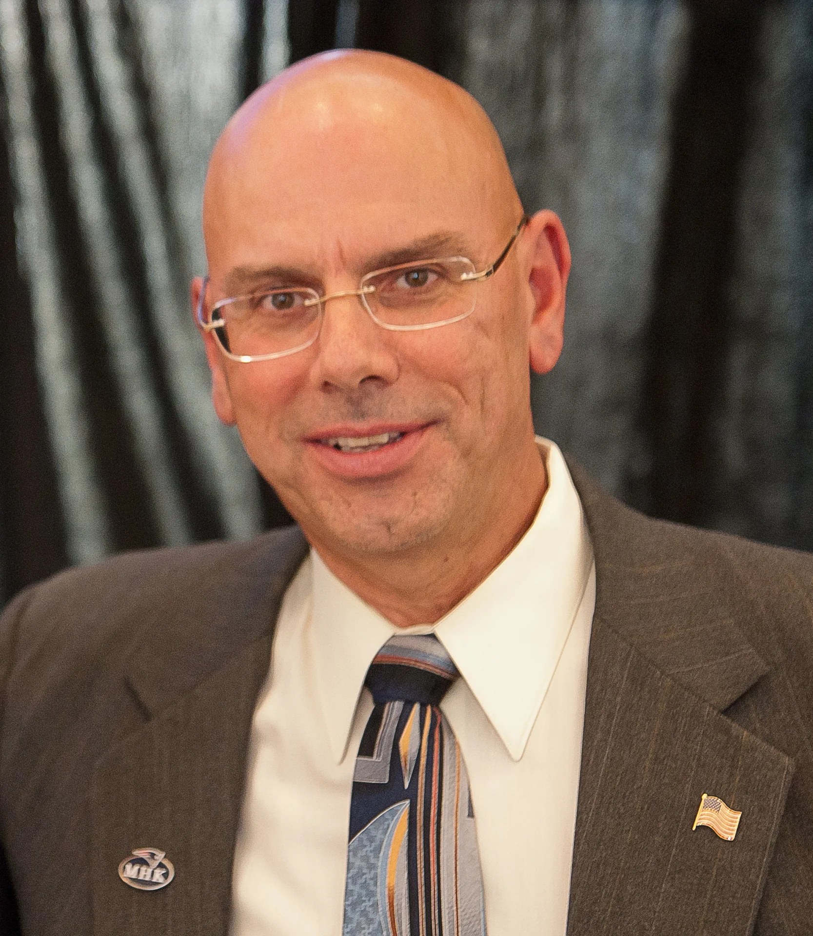 Brian Hagopian in a suit and tie
