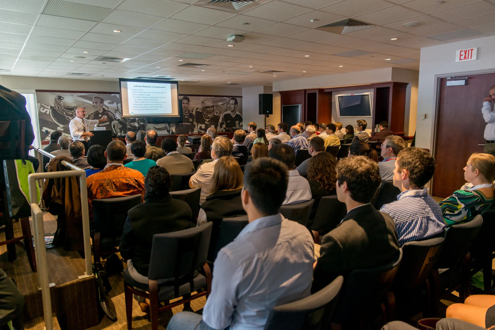 Brian Hagopian leading a technical water systems seminar for a large audience